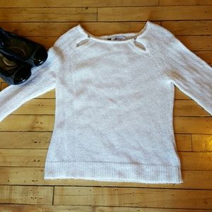 Jennifer Lopez fuzzy white sweater