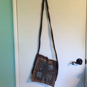 Brown cross body with stiching