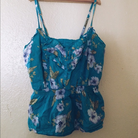 Peplum type spaghetti strapped shirt w buttons