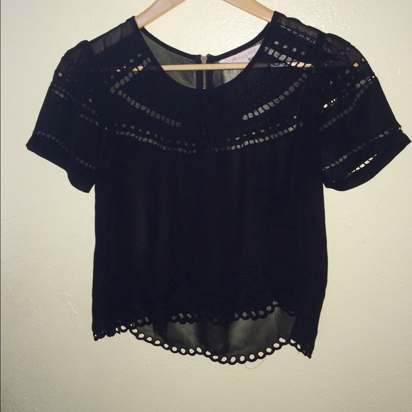 black flowy shirt w/ patterns