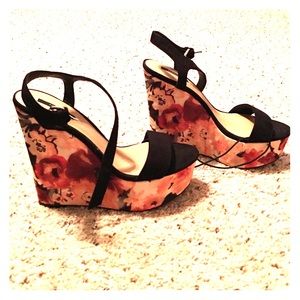 Black and floral pumps