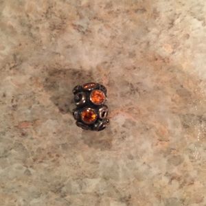 Authentic pandora charm! Orange gems