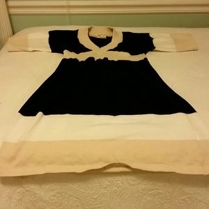 Tan, black, and cream dress