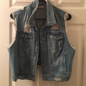 Destroyed denim vest