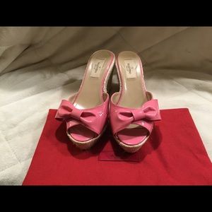 Authentic Valentino pink patent bow wedges.