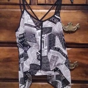 Newspaper print blouse