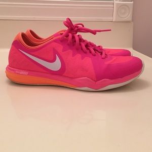 Women's pink and orange nikes Size 7.5