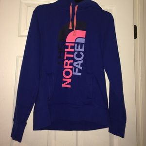 Blue North Face hoodie.