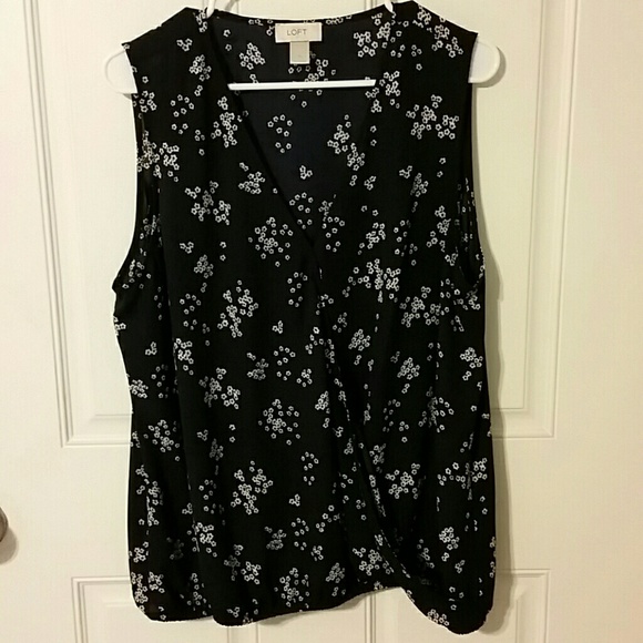 Blue and white sleeveless top