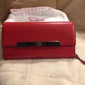 Authentic Christian Louboutin wallet with strap