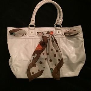 Gorgeous cream colored bag with scarf trim