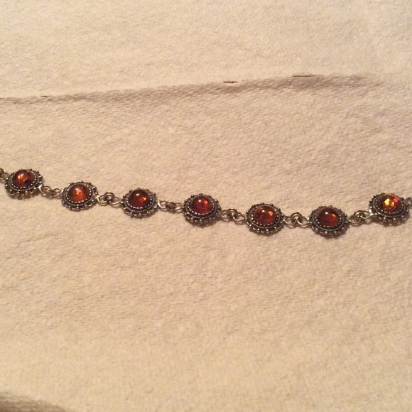 Old sterling silver bracelet w/ amber color stones