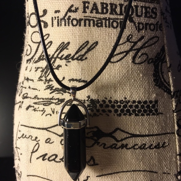 Black Stonehenge on black rubber necklace