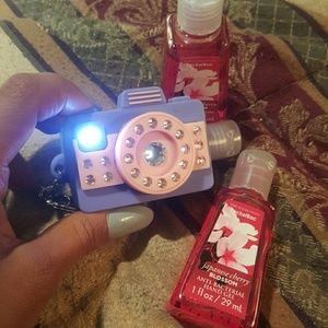 Key chain hand sanitizer holder