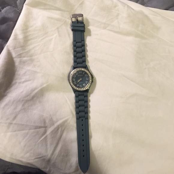 Grey banded watch w jeweled face