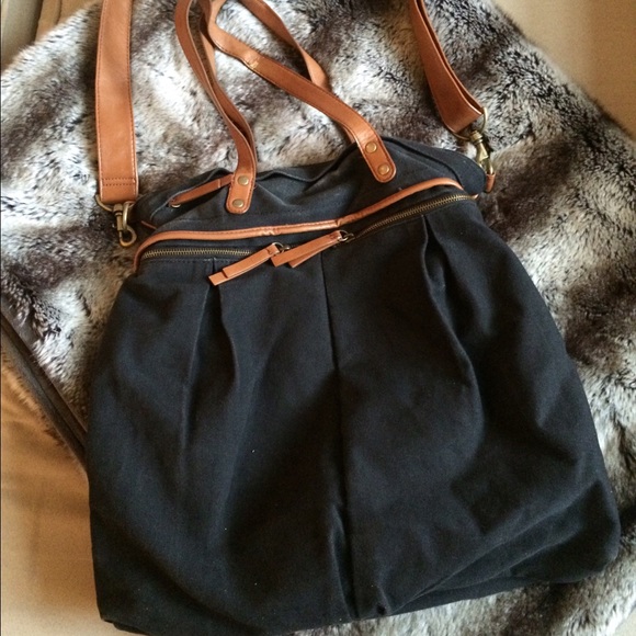 Urban Outfitters black canvas tote with tan straps