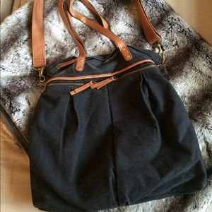 Urban Outfitters black canvas tote with tan straps