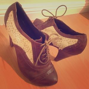 Heeled booties with lace design