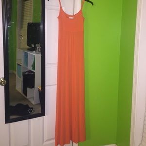 Calvin Klein orange dress.