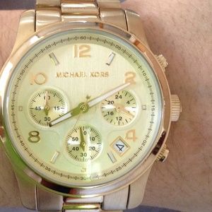 Michael Kors gold runway watch