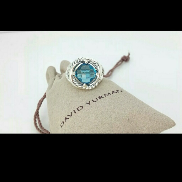 Infinity blue topaz ring
