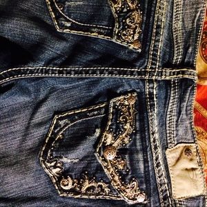 Silver Suki flap back pockets . Made to look worn.