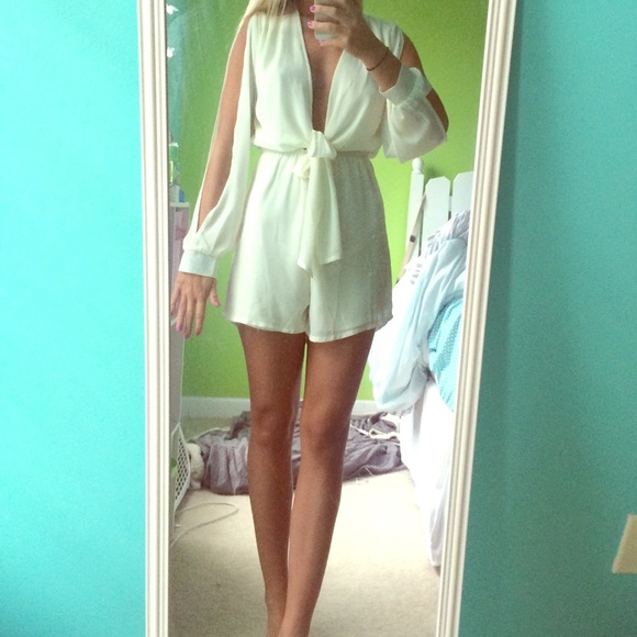 NEW cream deep plunge romper