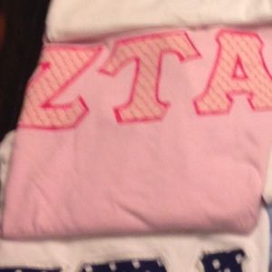 Pink ZTA letters
