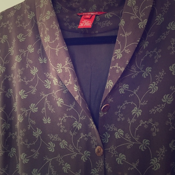 Brown silk with dainty turquoise floral pattern.