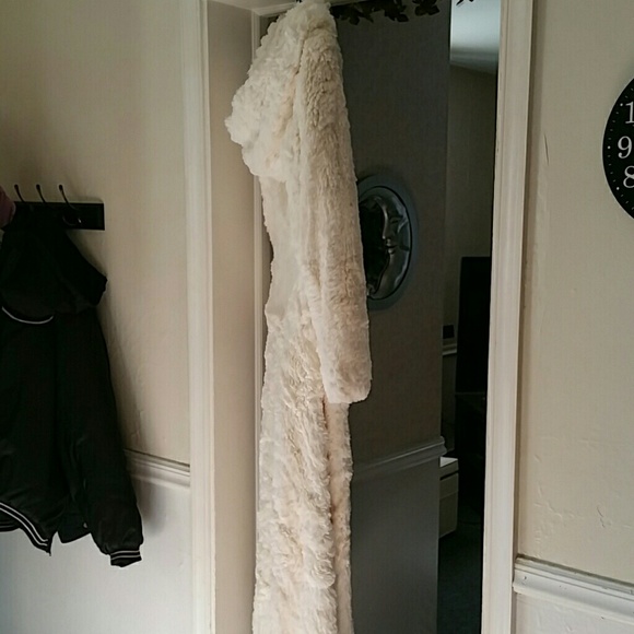 White faux fur coat