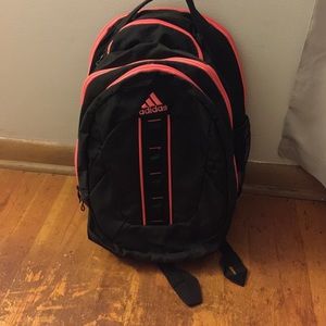 Pink and black adidas backpack