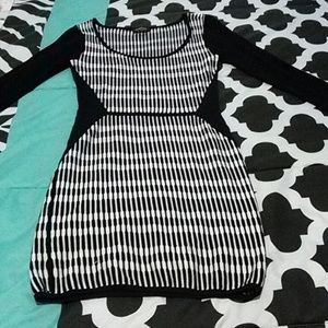 BEBE Black and White Body Con dress