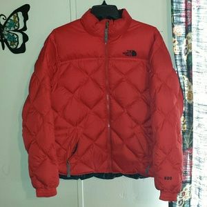 Red north face jacket.