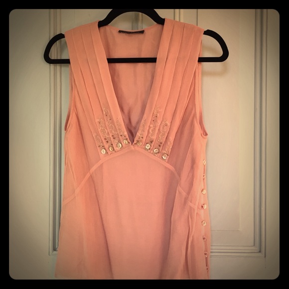 Silk sleeveless blouse with embroidery and buttons