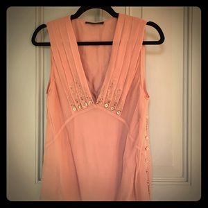 Silk sleeveless blouse with embroidery and buttons