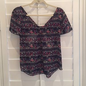 Flowery navy blue top with semi open back