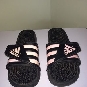 Pink and black Nike sandles