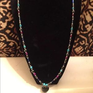 Hand crafted necklace with a heart pendant