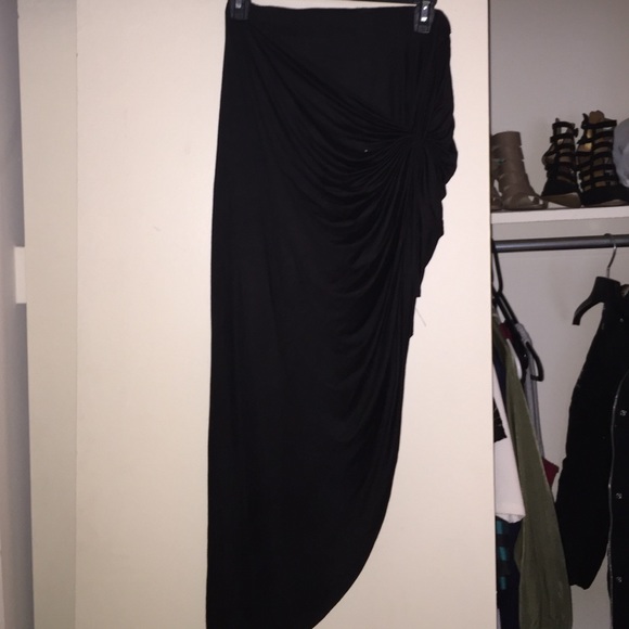 Black asymmetrical skirt with side knot.
