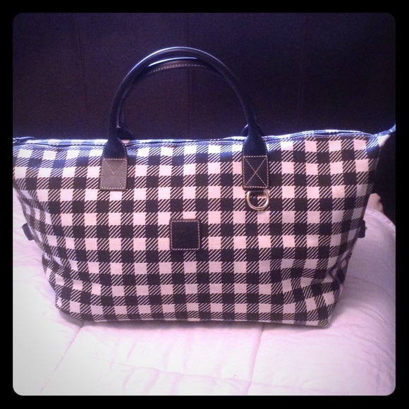 Dooney & Bourke Handbags - SALE! 💚 Dooney & Bourke luggage duffle bag 💚