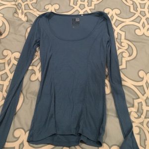 tight blue long sleeve shirt
