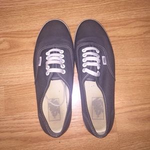 Gray Vans.