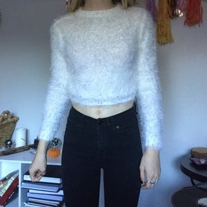 white furry sweater with beads
