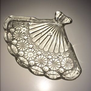 A glass fan plate with hand crafted marbles