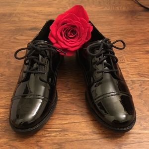 Black patent leather shoes. Never worn.