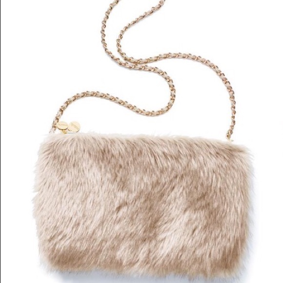 Mark. Warm up to it Muff Bag