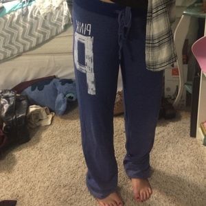navy pair of pink vs sweatpants
