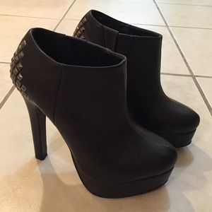 Black studded ankle boots.