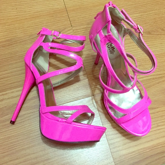 Hot pink strappy heels.