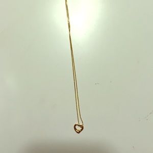 Tiffany & Co. Gold heart necklace. Barely worn